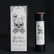 Gothic Garden ritual candle and skull-and-rose gift box on a black background