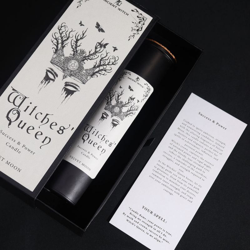 Witches’ Queen ritual spell card beside the candle